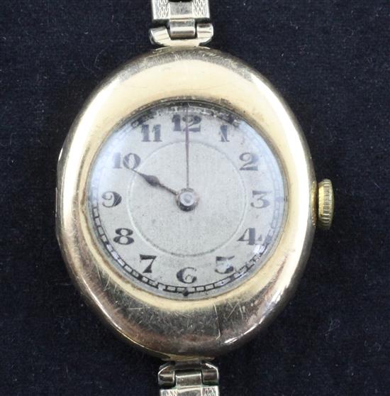 A ladys 1920s 15ct gold Rolex manual wind wrist watch,